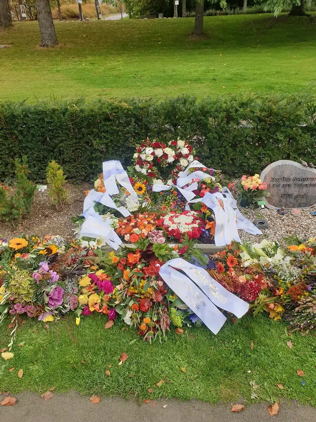 Blomsterne på gravstedet